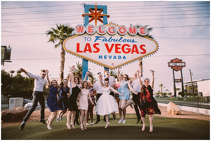Wedding Party Jumping at Las Vegas Sign