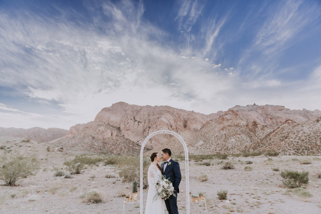 las vegas desert elopement bride and groom pose