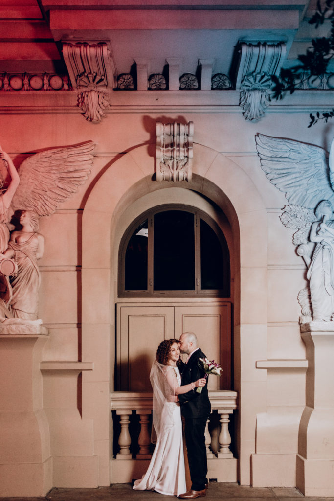 vegas strip wedding photos Paris hotel bride and groom kiss