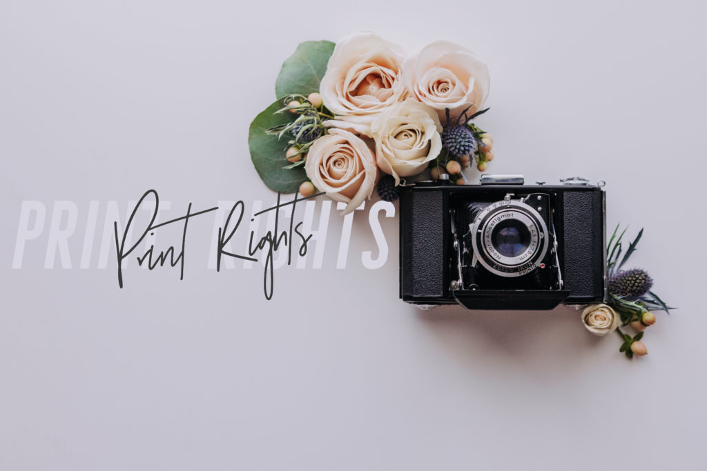 what are print rights floral flatlay featuring vintage camera