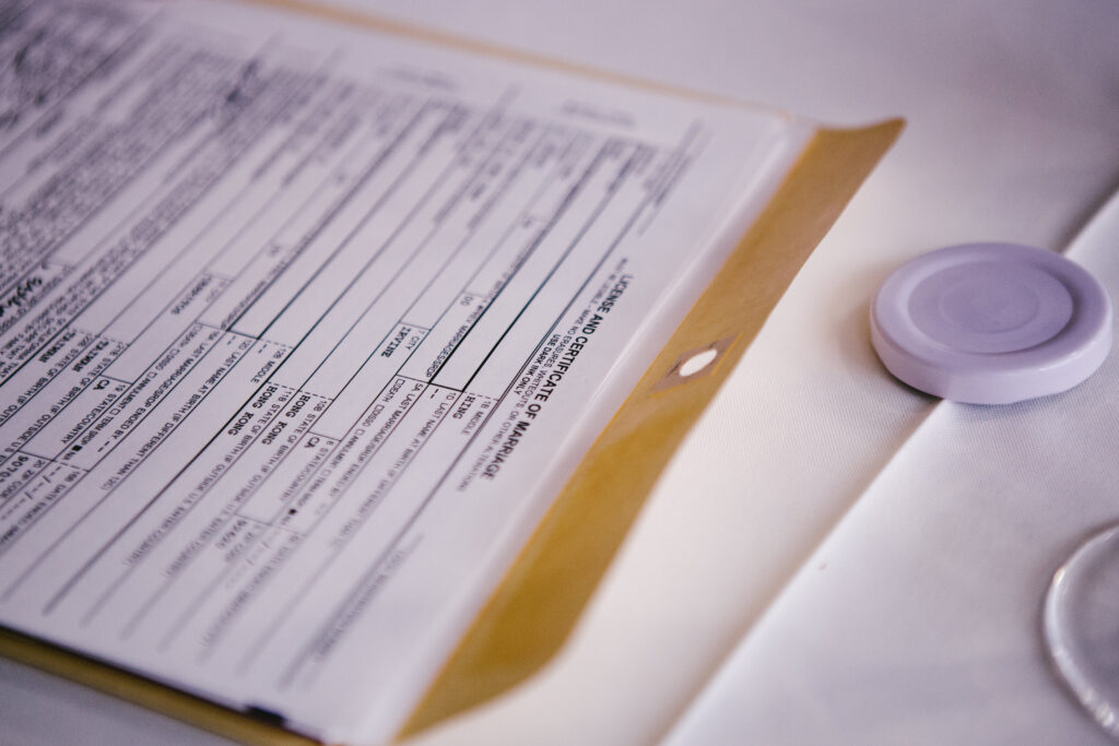 A California marriage license sits on a table ready to be signed.