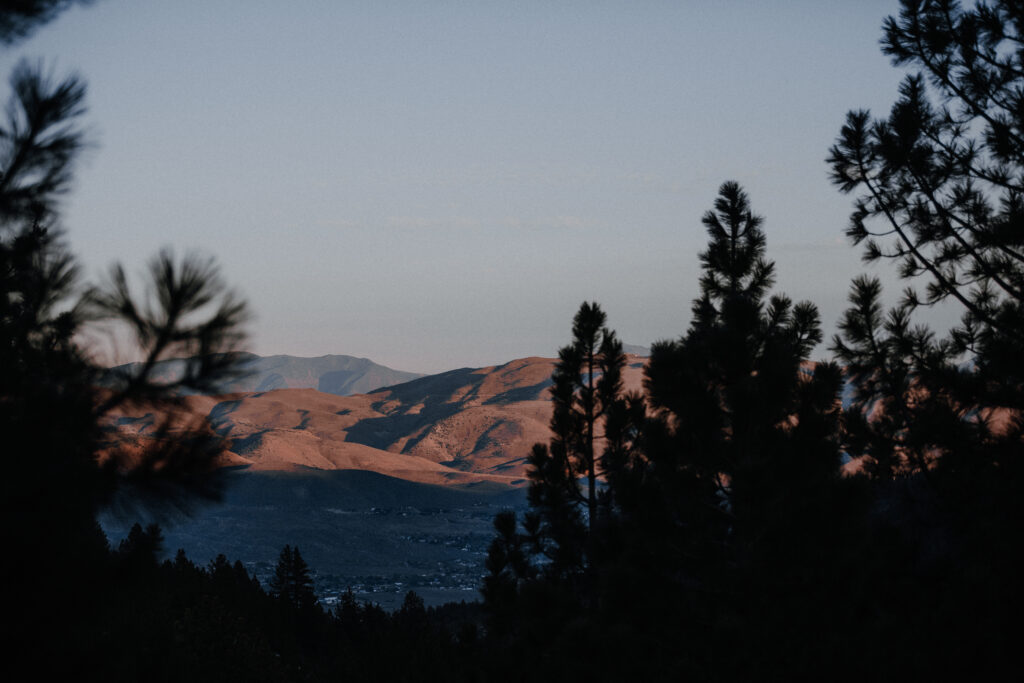 A view of the Sierra Nevadas and Washoe Valley in the distance at sunset looking east.